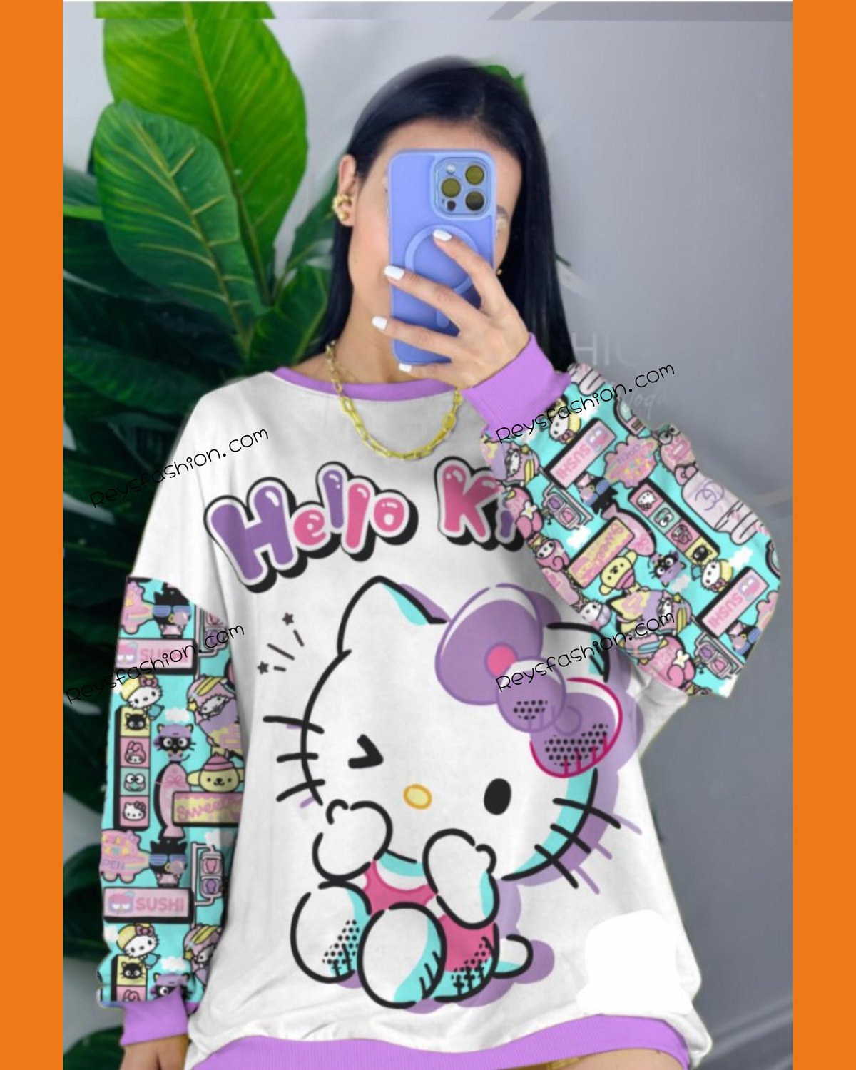 Suéter oversize de cuello redondo Hello Kitty Mundo Mágico